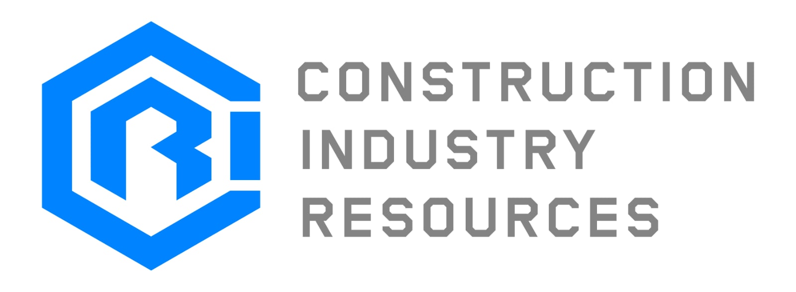 Close-up of blueprints or construction documents spread out on a table, symbolizing industry resources.